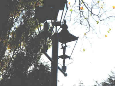 A vandalised security camera light