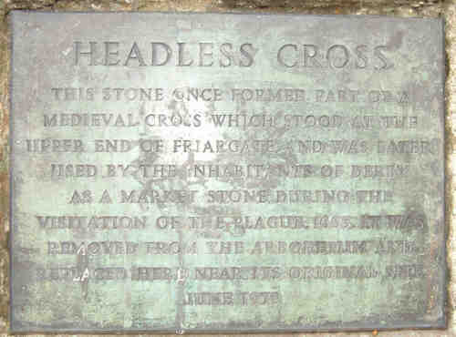Plaque giving history of the Headless Cross, this plaque is set into the stone
