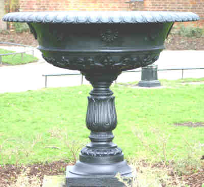 The last remaining original urn, fully restored and painted black