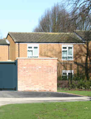 the building has now been replaced by a walled compound